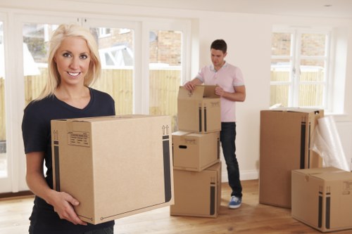 Local packing team organising boxes for a central London move