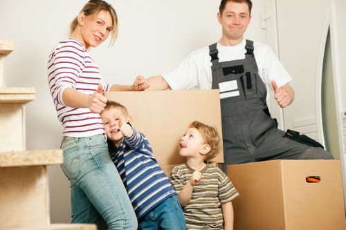 Moving household furniture through a narrow stairwell in Finsbury